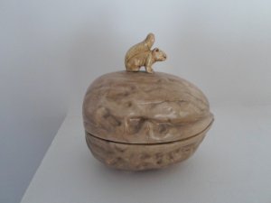 Walnut Shaped Ceramic with a Squirrel on Top