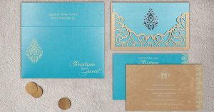 Moderate Orange Shimmery Damask Themed Laser Cut Wedding Card